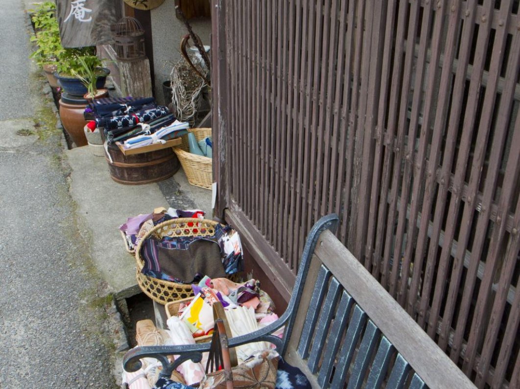 Scraps of kimono fabric line this storefront
