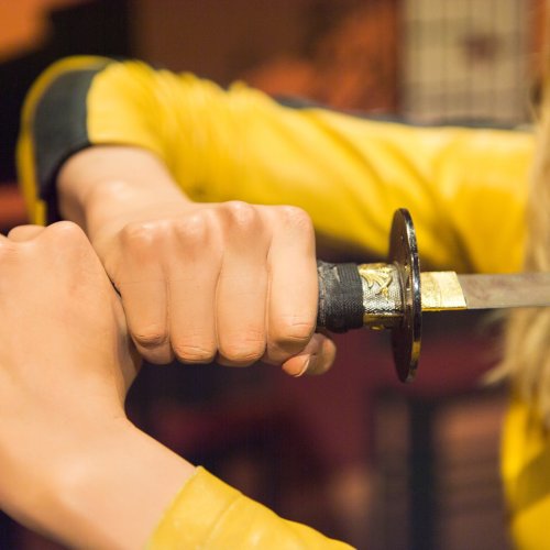 A figure of Uma Thurman in Kill Bill, holding her katana
