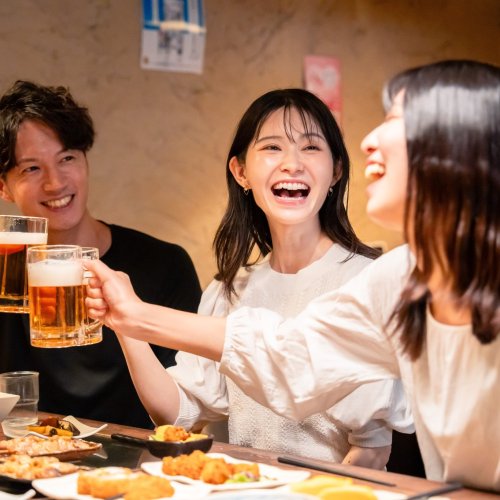 A group of friends drinking in a bar