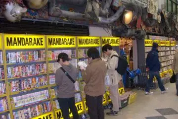 <p>Are you going to buy that? Browsers at Mandarake's main comics store</p>