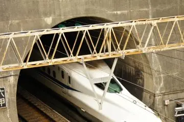 The shinkansen coming out of the tunnel which starts&nbsp;near Mount Rokko and exits just before the arrival at&nbsp;Shin Kobe Station. The picture was&nbsp;taken from the hiking trail starting point of Mount Maya.