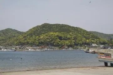 At the small port just as you cross the bridge onto the island from the mainland