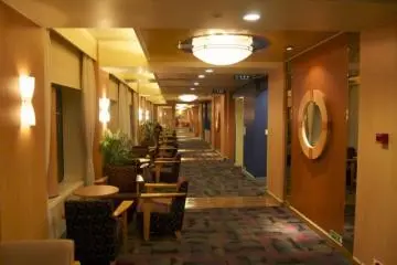 <p>Hallway running starboard on the ship from the common area.</p>