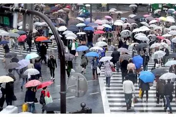 <p>Hujan di Shibuya Crossing, Tokyo, Jepang</p>
