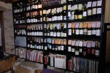 Empty wine bottles at the rack