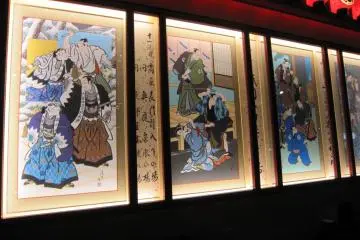 <p>Colored woodblock prints of Kabuki plays</p>