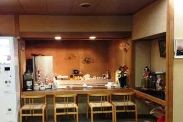 <p>An intimate yet understated sushi bar counter awaits you at Hotel Yoshida</p>