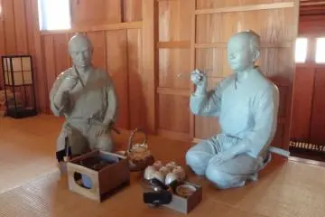 Officials having tea.