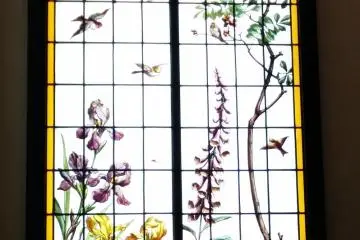 <p>Some artwork that looks like stained glass on the staircase.&nbsp;</p>
