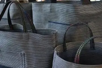 <p>A selection of tote bags made in-shop from Kurashiki denim.</p>