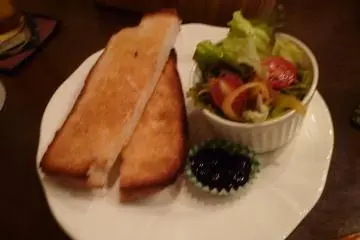 Breakfast set of butter toast and salad
