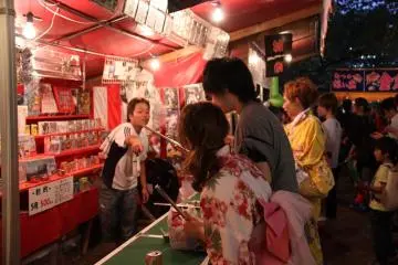 Girls clad in Yukata playing games
