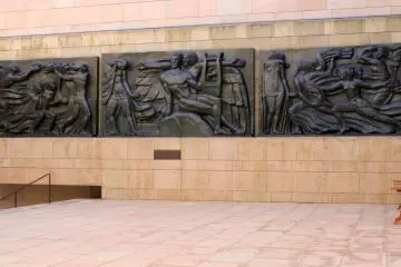 <p>Egyptian style art on the hard elegantly-designed concrete wall</p>