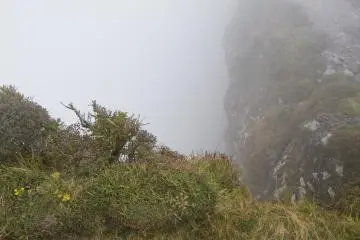 <p>A look down into the crater was limited with rain clouds passing by on this day</p>