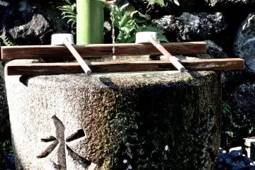 Purification font at the temple