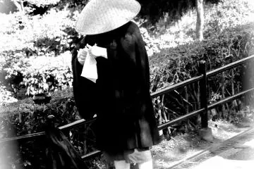 A traveling monk accepting alms