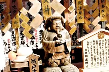 <p>Inside the shrine, catching the early morning light. Like many temple/shrines in Japan, there was a mixture of the two religions present.</p>