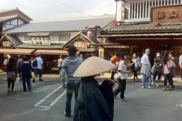 <p>A lone monk near the entrance to Kiyomizu Temple</p>