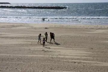 <p>The broad stretch of sand gives you space to run or enjoy an isolated spot</p>