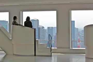 You can find pairs of high white chairs along the modern &amp; chic space on the north side of the indoor observation floor. Another romantic spot at the observatory.