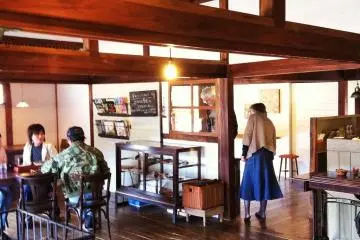 It's a really spacious area with lots of dark wood and antique furniture.