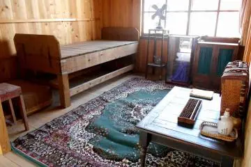 <p>Officer's room. Different from soldiers' compartments, it's more lavishly decorated and there's even a doll displayed inside the glass box</p>