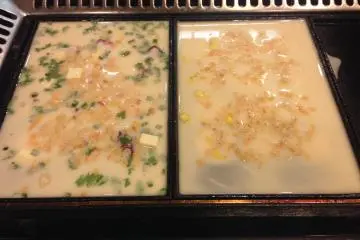 The batter goes on last, and then the heat is turned down to medium.