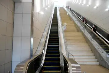<p>Climbing up the long escalator to reach the entrance of Otuka Museum of Art</p>