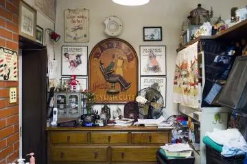<p>Near the back area of the barbershop.</p>