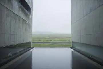 <p>From inside the museum looking out towards the sloping fields.</p>
