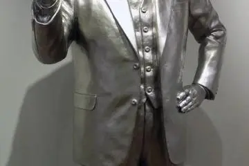 <p>Momofuku Ando, creator of the cup of noodles, shines bright in a museum hallway.&nbsp;</p>