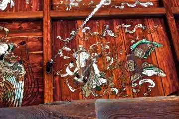 <p>Vault painting and chains that the bell hangs from</p>