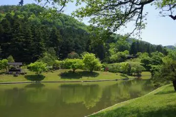 <p>Man-made lake and peaceful garden</p>