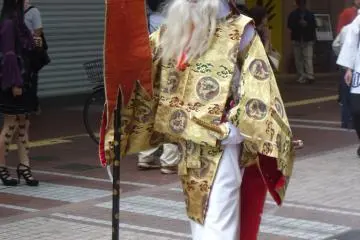 <p>This is Sarutahiko Okami, a deity of the Shinto religion and a symbol of strength and guidance. He is wearing traditional Japanese wooden sandals called geta.</p>