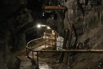 <p>The cave walkway slopes around corners as well as going up and down from time to time.</p>
