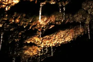 <p>Natural ice (stalactite) hanging from the ceiling of the cave. Stalagmites, ice coming up from the ground, can be found too.</p>