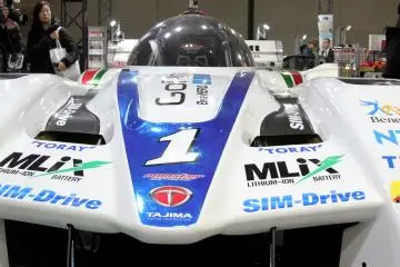 This super race car looked very impressive in real life, with super sleek body lines and a million of sponsorship stickers on it.&nbsp;
