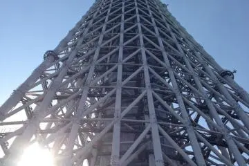 The Tower going up, the Sun going down