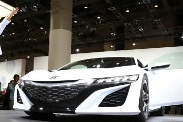 Honda had many new cars on display including this all white offering including what seems to be the only male model at the show.&nbsp;