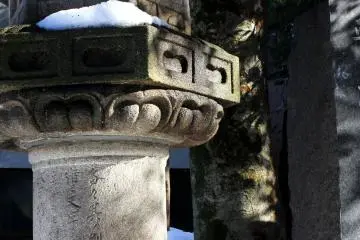 The architecture on the short columns is amazing, especially dripping with water from the melting snow. 