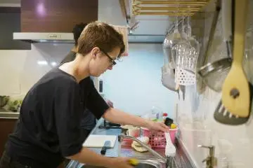 <p>People cooking</p>