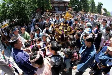 <p>The children are also involved in the festival and they have their own small version of a "mikoshi" that they carry around.&nbsp;</p>