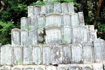 <p>A collection of stones in the shape of a pyramid</p>
