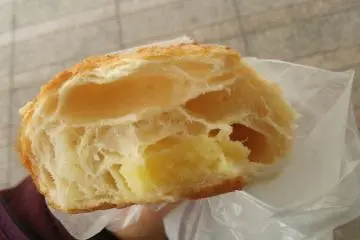<p>A fresh croissant filled with custard - moreish!</p>