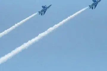 <p>Two jets race towards dizzying heights</p>