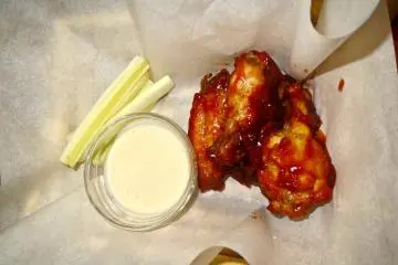 <p>Spicy bbq buffalo wings, celery sticks and Cesar dressing... In a word, "Yes."</p>