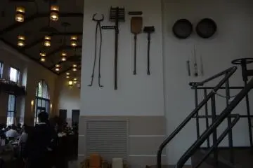 There are some instruments on the wall used to mix malt and to check the temperature.