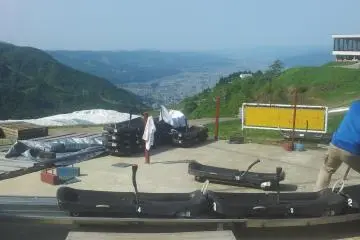 <p>Slide in the playground with cable car to GALA behind</p>