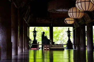 <p>Small seated stature inside the main worship hall</p>