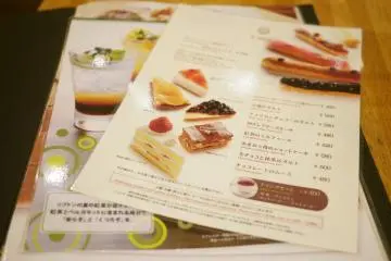 <p>A menu full of cakes.</p>